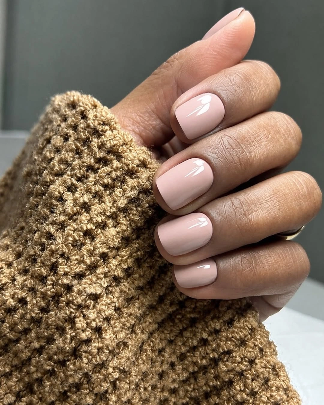 Short chocolate nails with pale blue dot accents