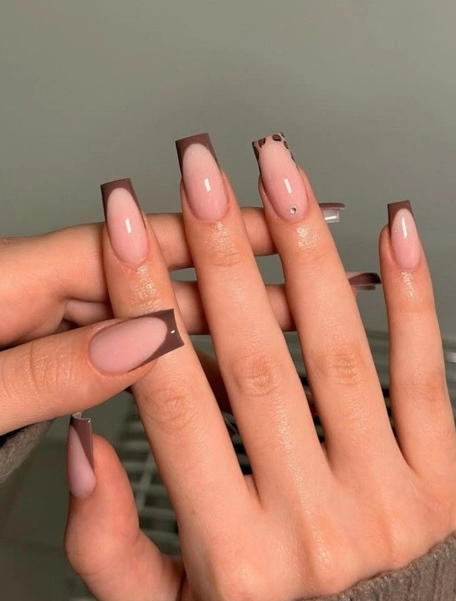 Medium almond nails in a glossy olive green shade