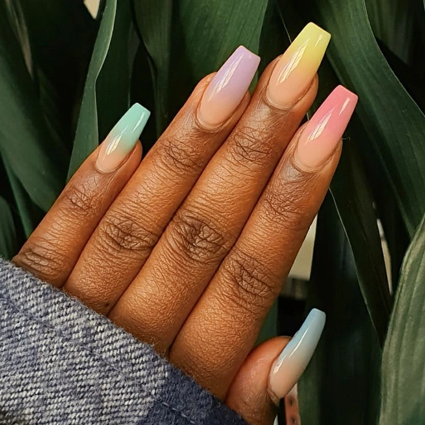 Pastel fade coffin nails with sheer nude base