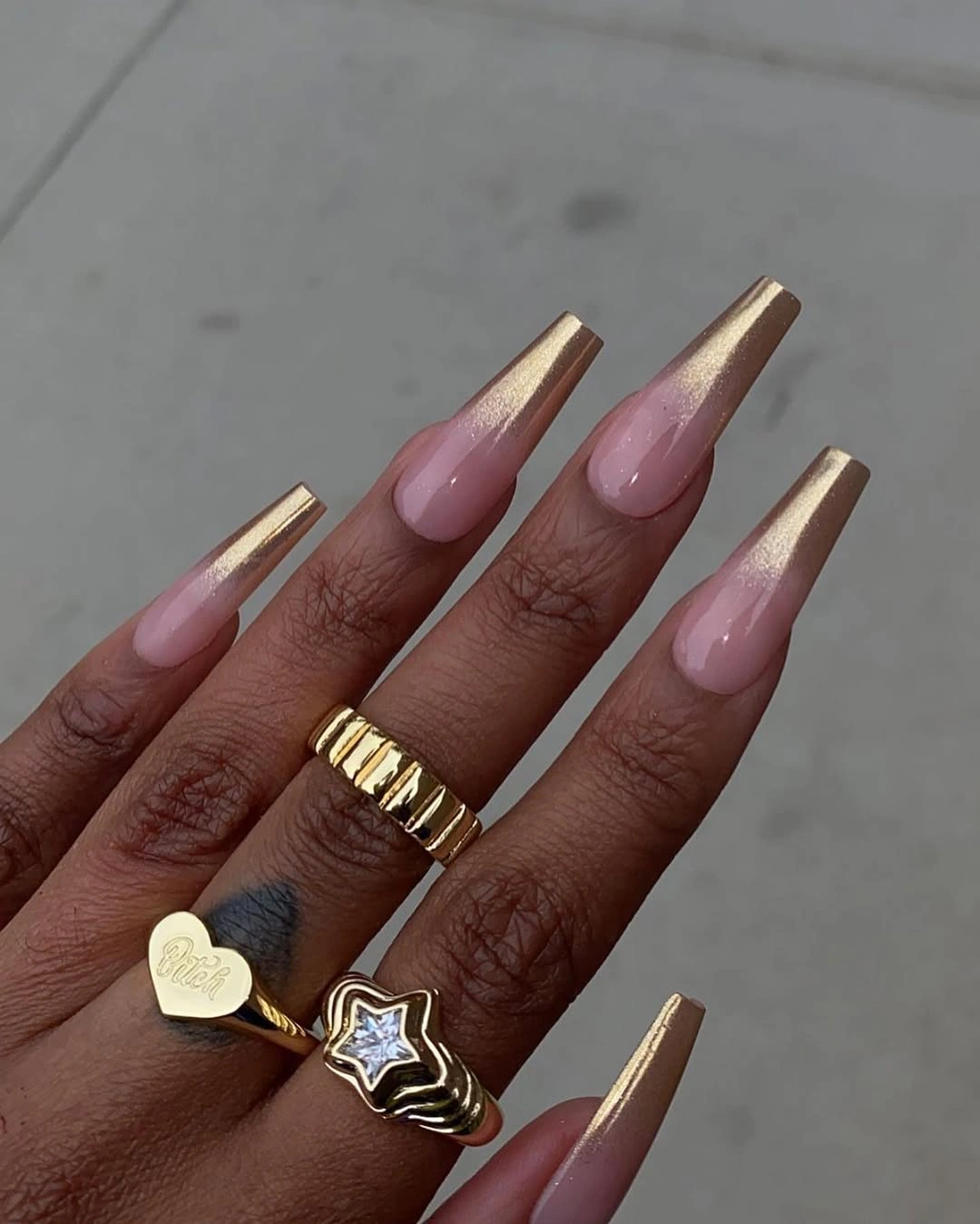 Pink coffin nails with metallic gold brown tips