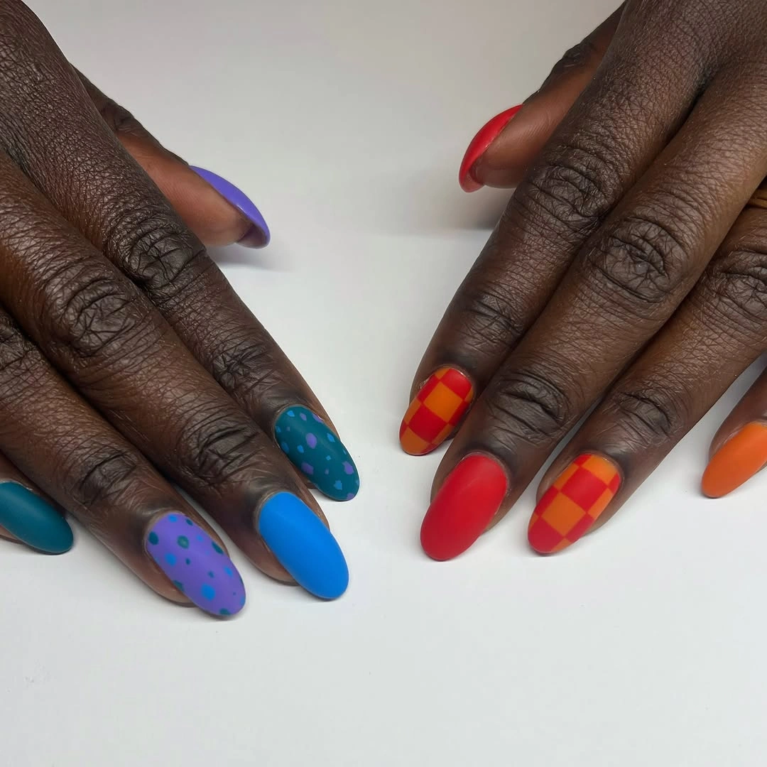 Short mixed color nails with dots and checkerboards