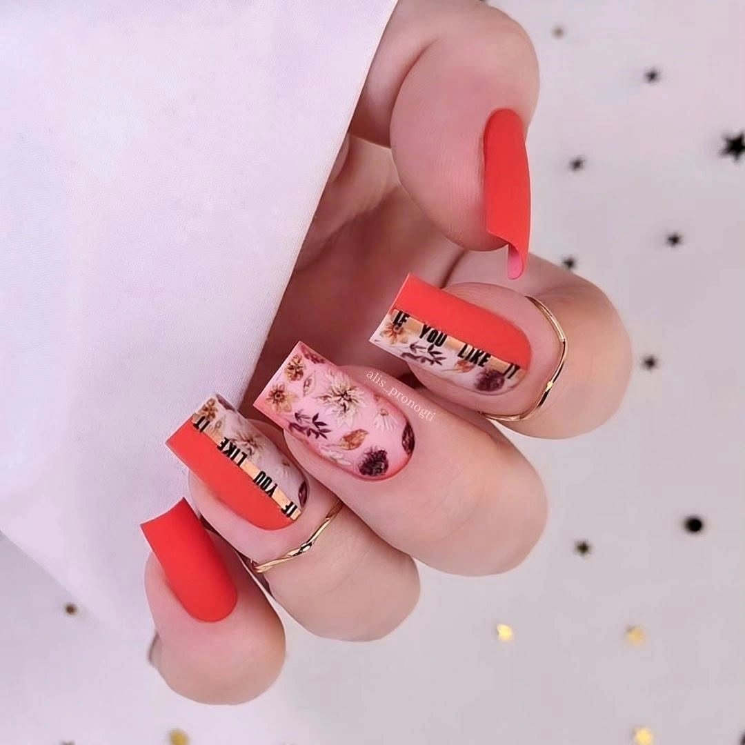Long coral square nails with pale graphic illustrated accent panels