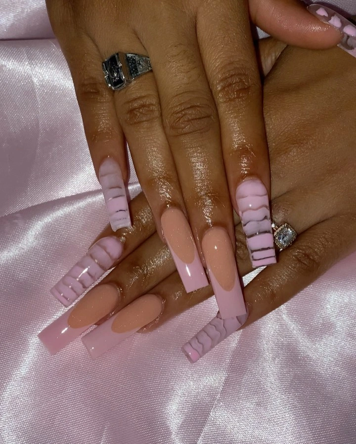 Very long square nude nails with lavender textured side accents