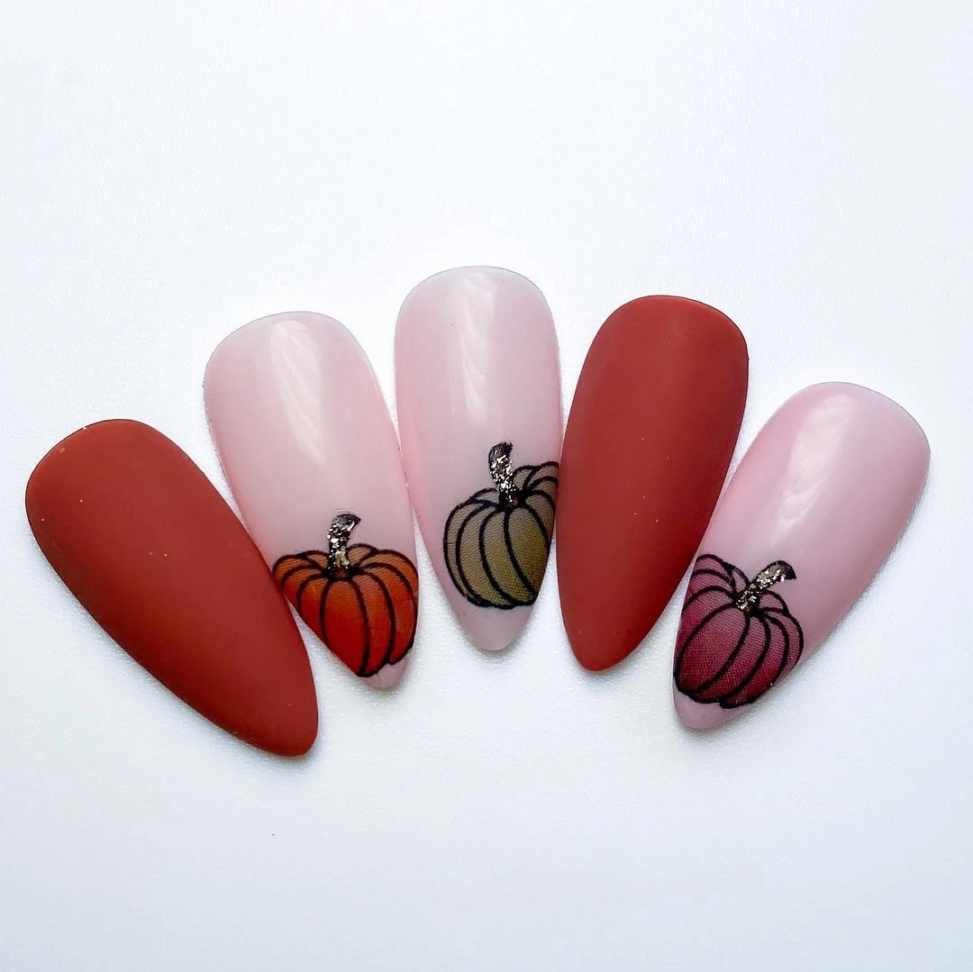 Red white and blush almond tips with outlined pumpkins
