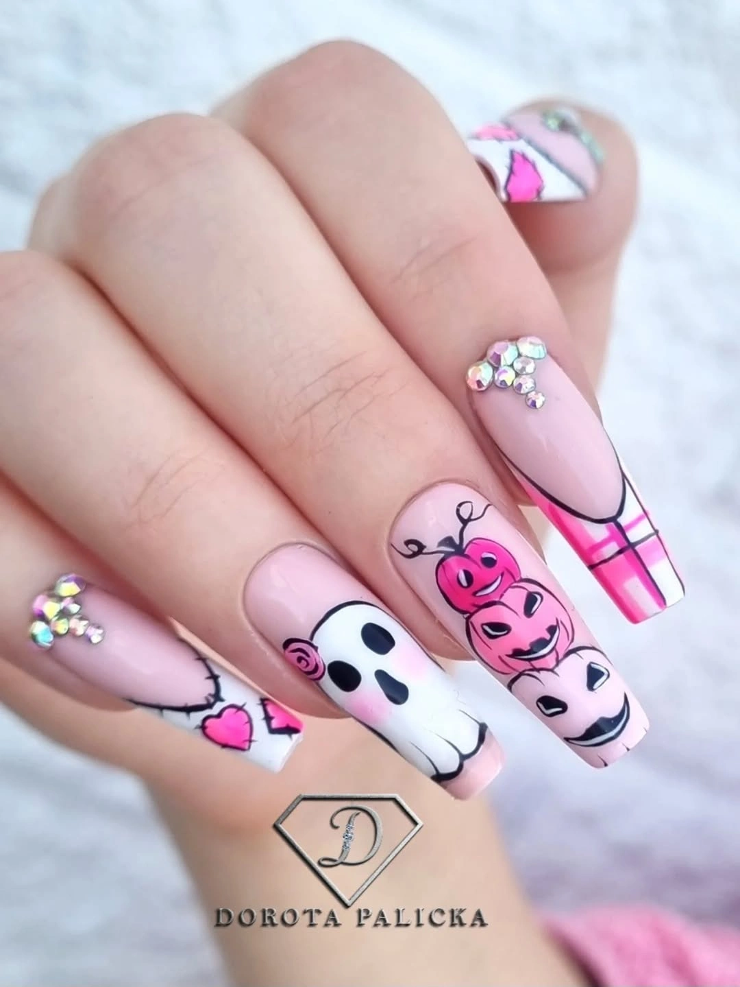 Lavender square nails with pink characters, ghosts, and hearts