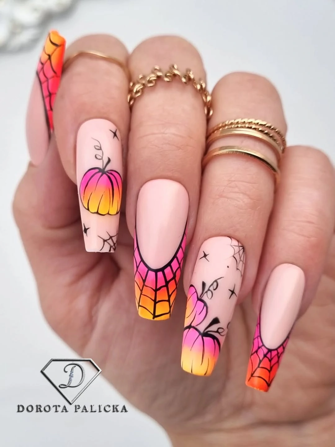 Warm gradient nails with pumpkin and spiderweb line details