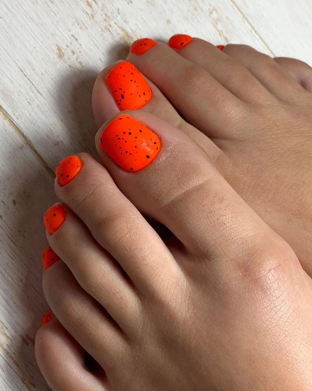Bright orange speckled short fall pedicure
