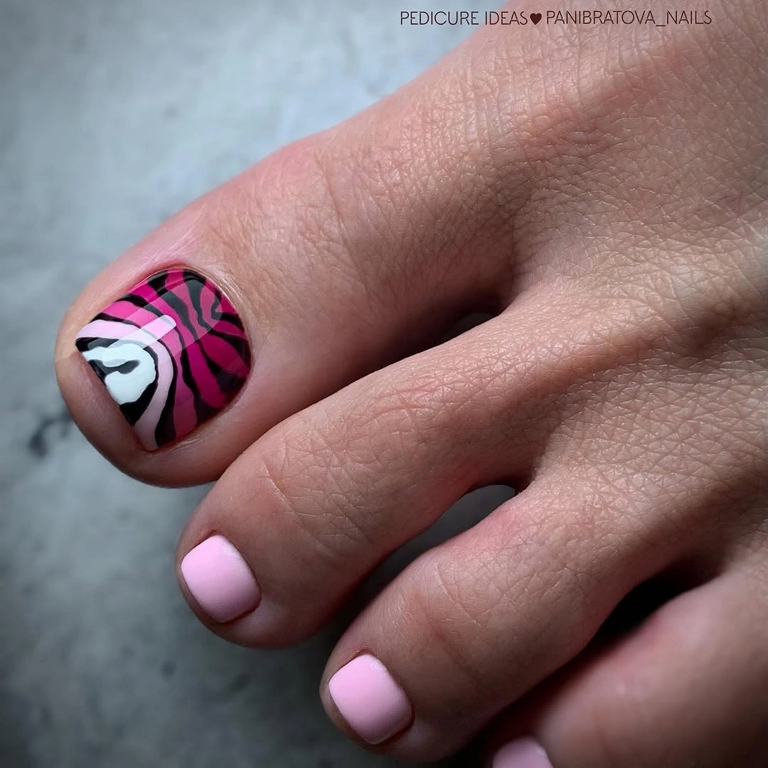 Pale pink pedicure with berry zebra accent