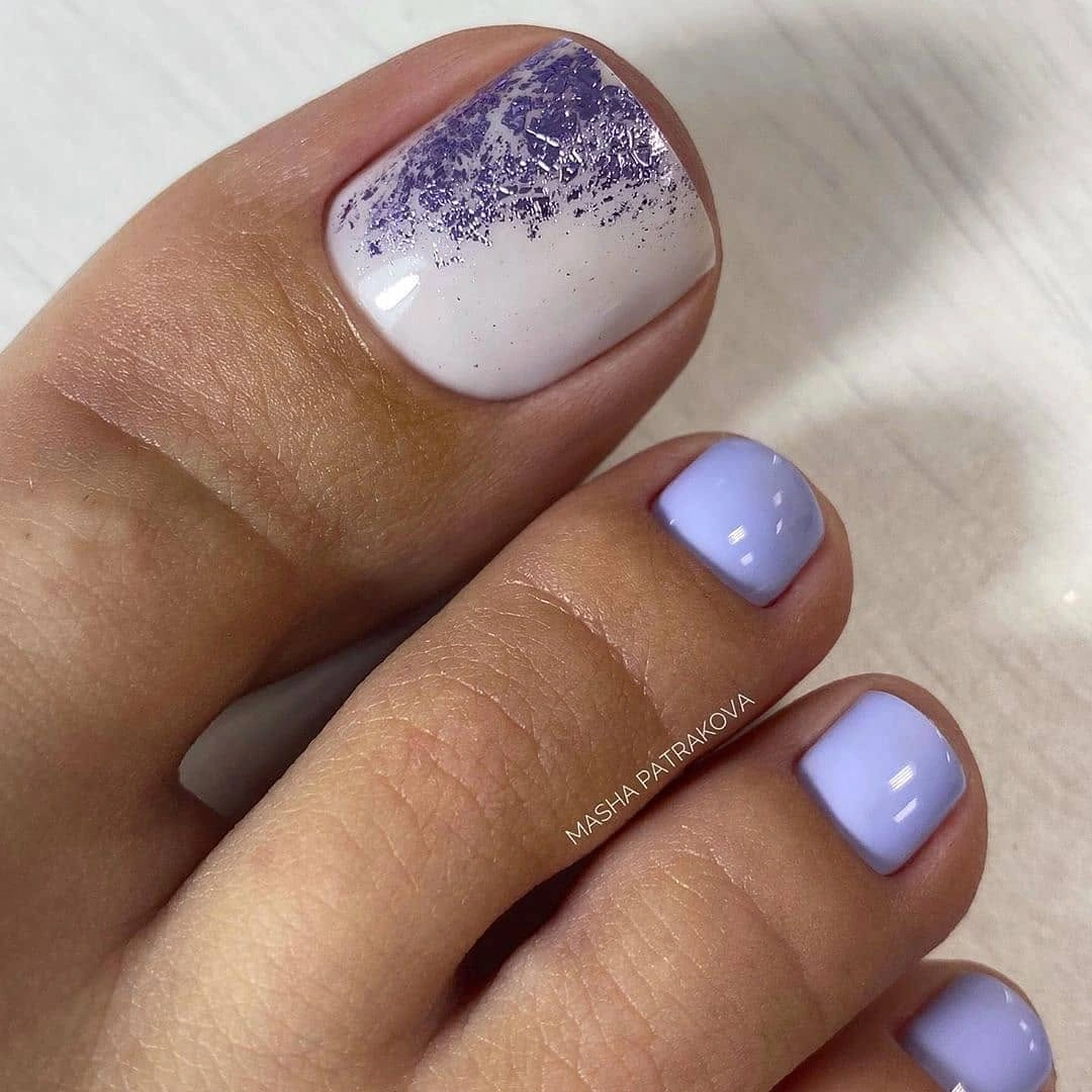 Lavender pedicure with purple glitter fade