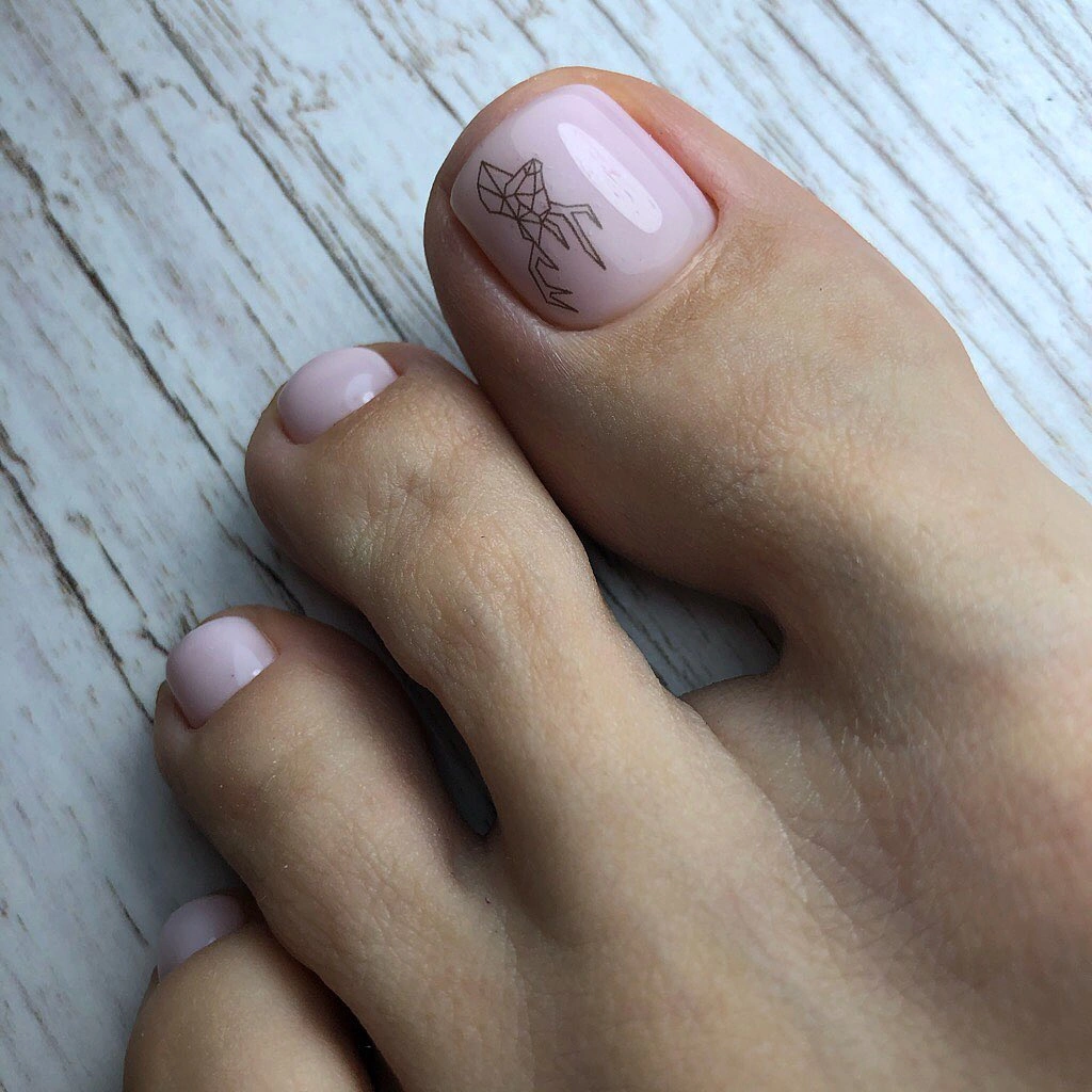 Pale pink pedicure with brown leaf line art
