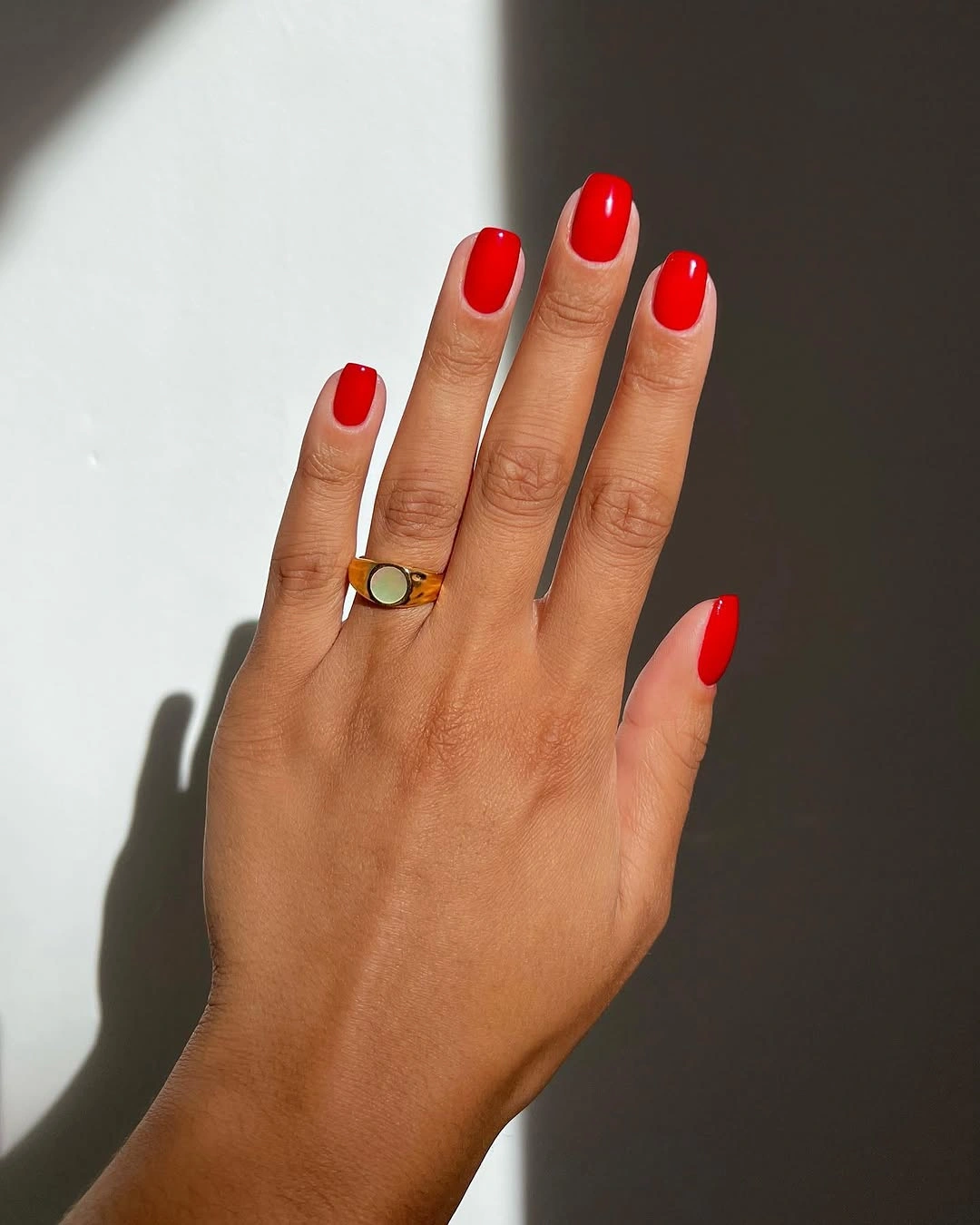Short square bright red glossy manicure