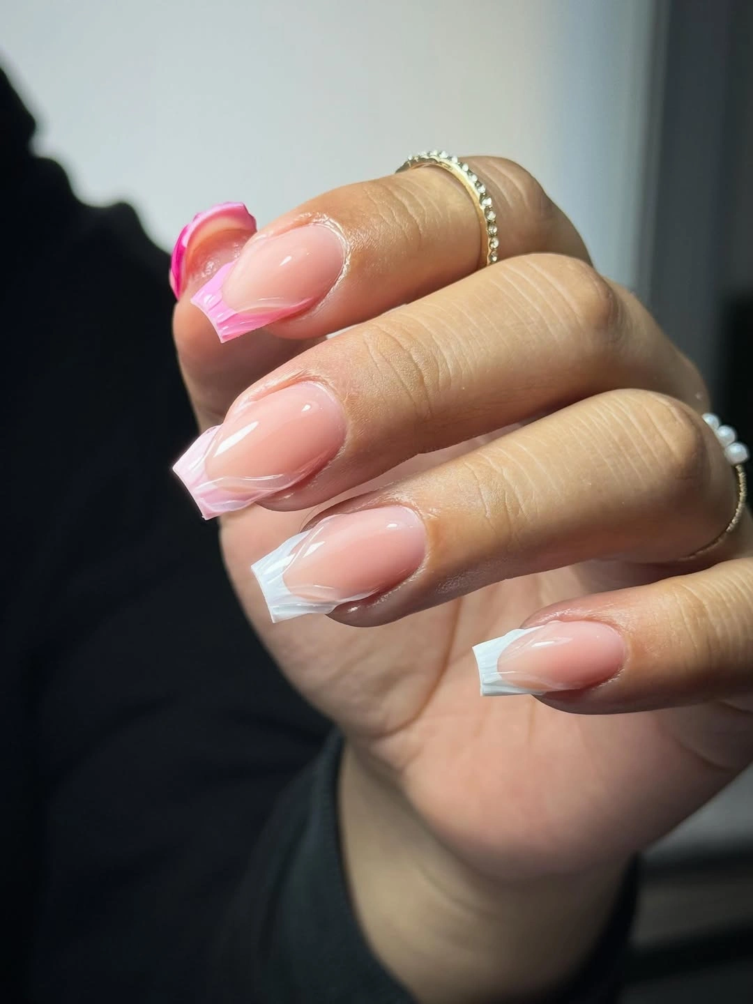Short glossy pink square nails with thin white French tips