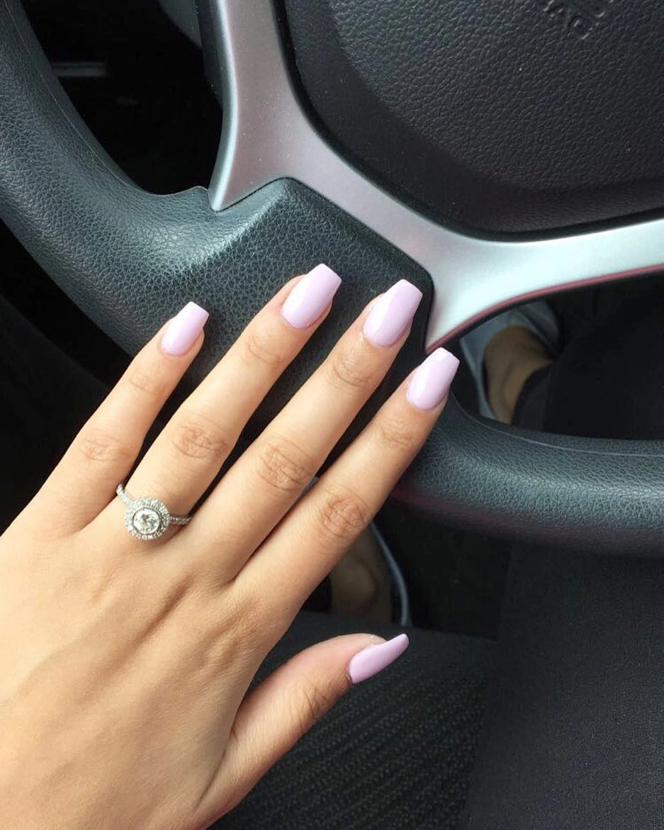 Short square nails in a glossy pale lavender pink shade