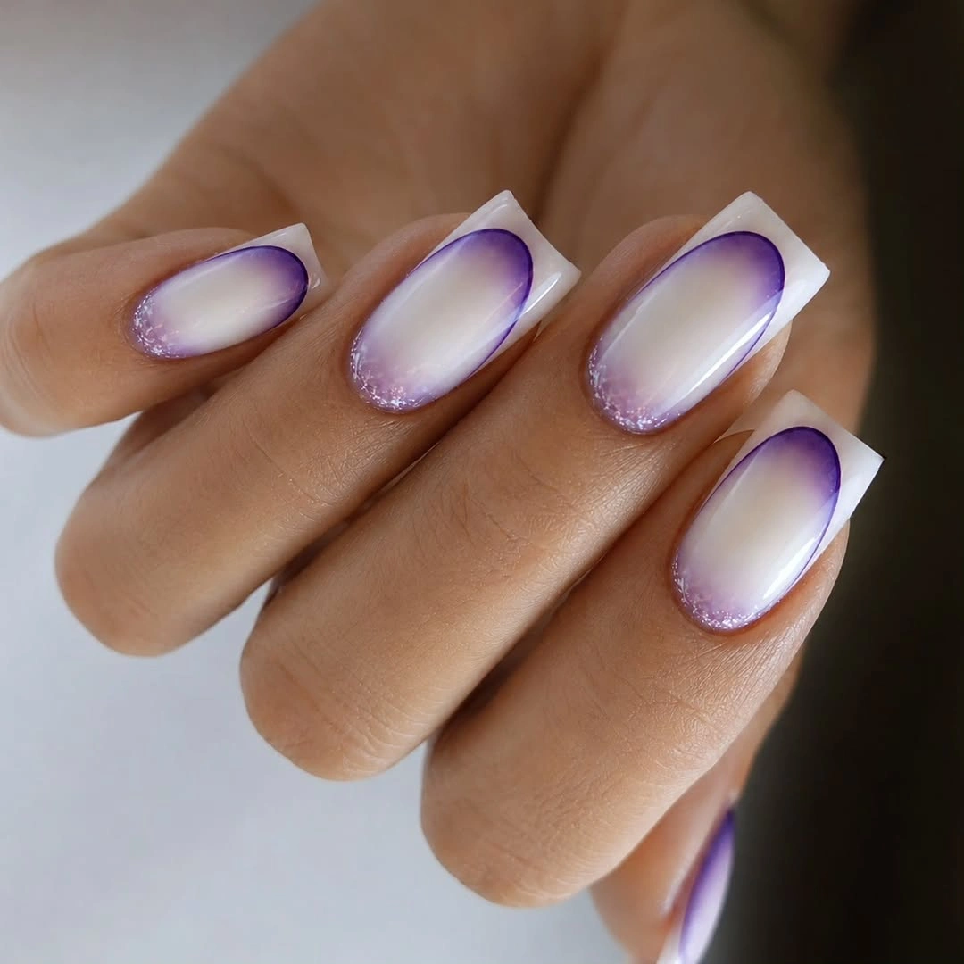 Long square nails with creamy centers and violet purple shading around the edges
