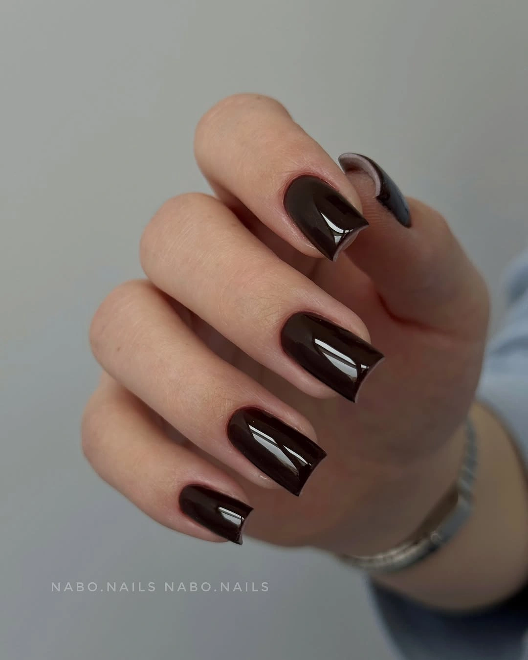 Medium square nails in uniform glossy deep chocolate brown