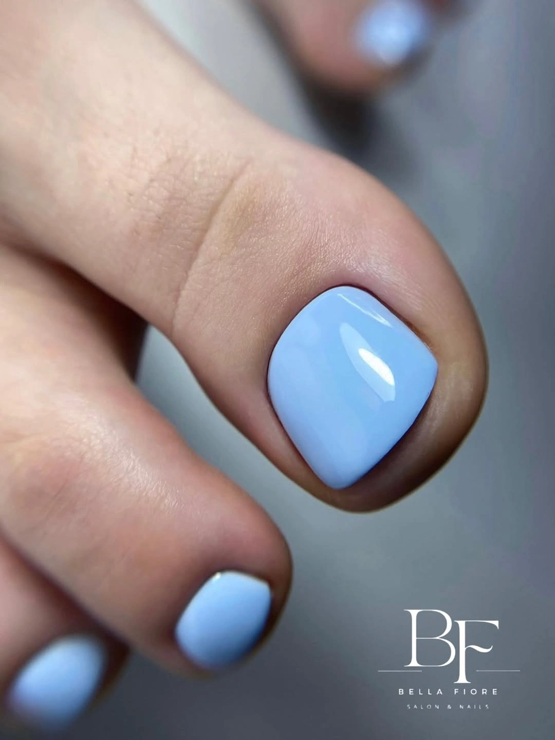 Short glossy powder blue toes with rounded square edges