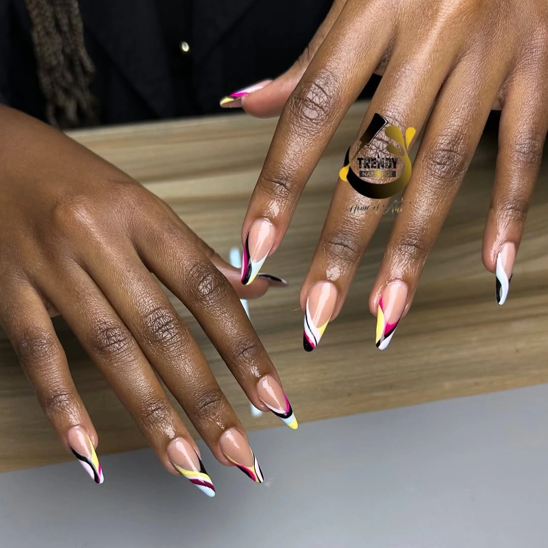 Long almond pink nails with neon yellow and hot pink tips