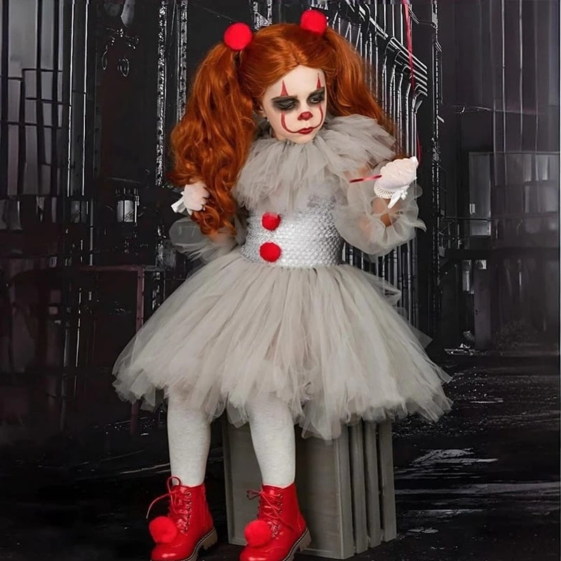 Pennywise child tutu costume with red boots, wig, ruffles, and pom-poms