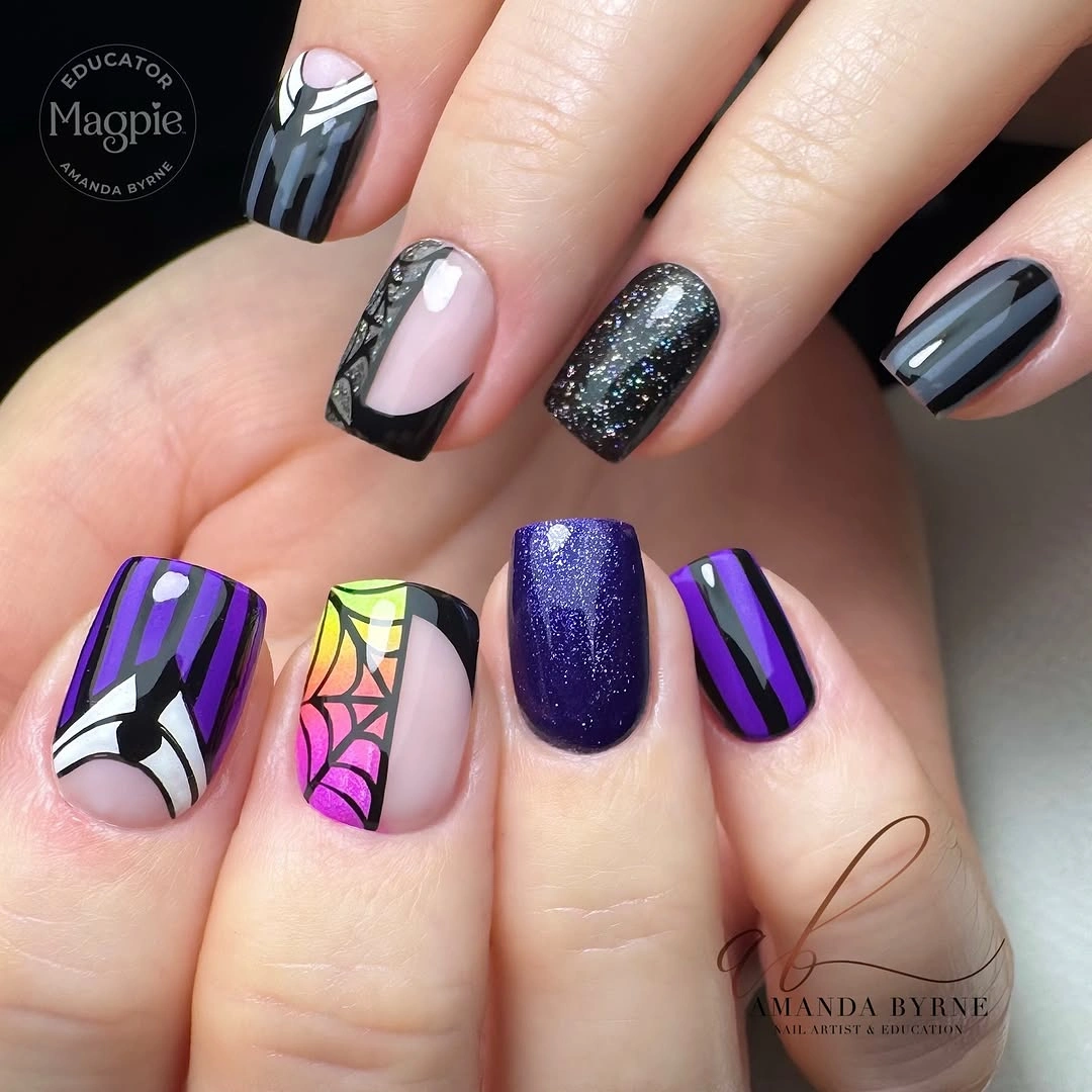 Square nails with purple stripes, glitter, and one web accent