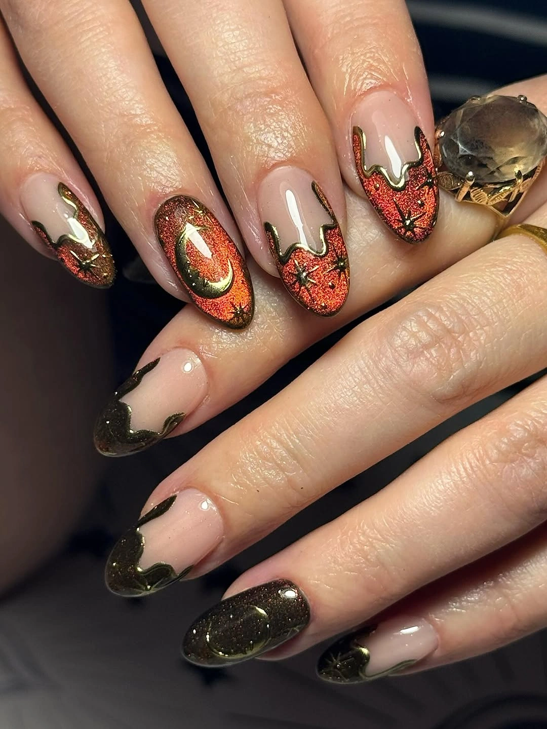 Almond nails with copper glitter tips and white drip details