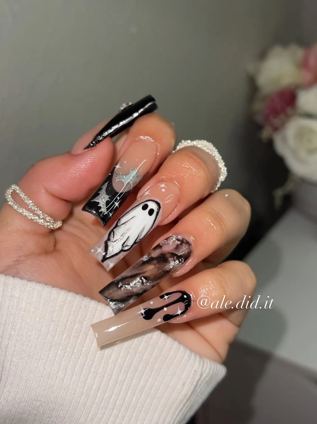 Long coffin nails with black tips, white ghost, and smoky art