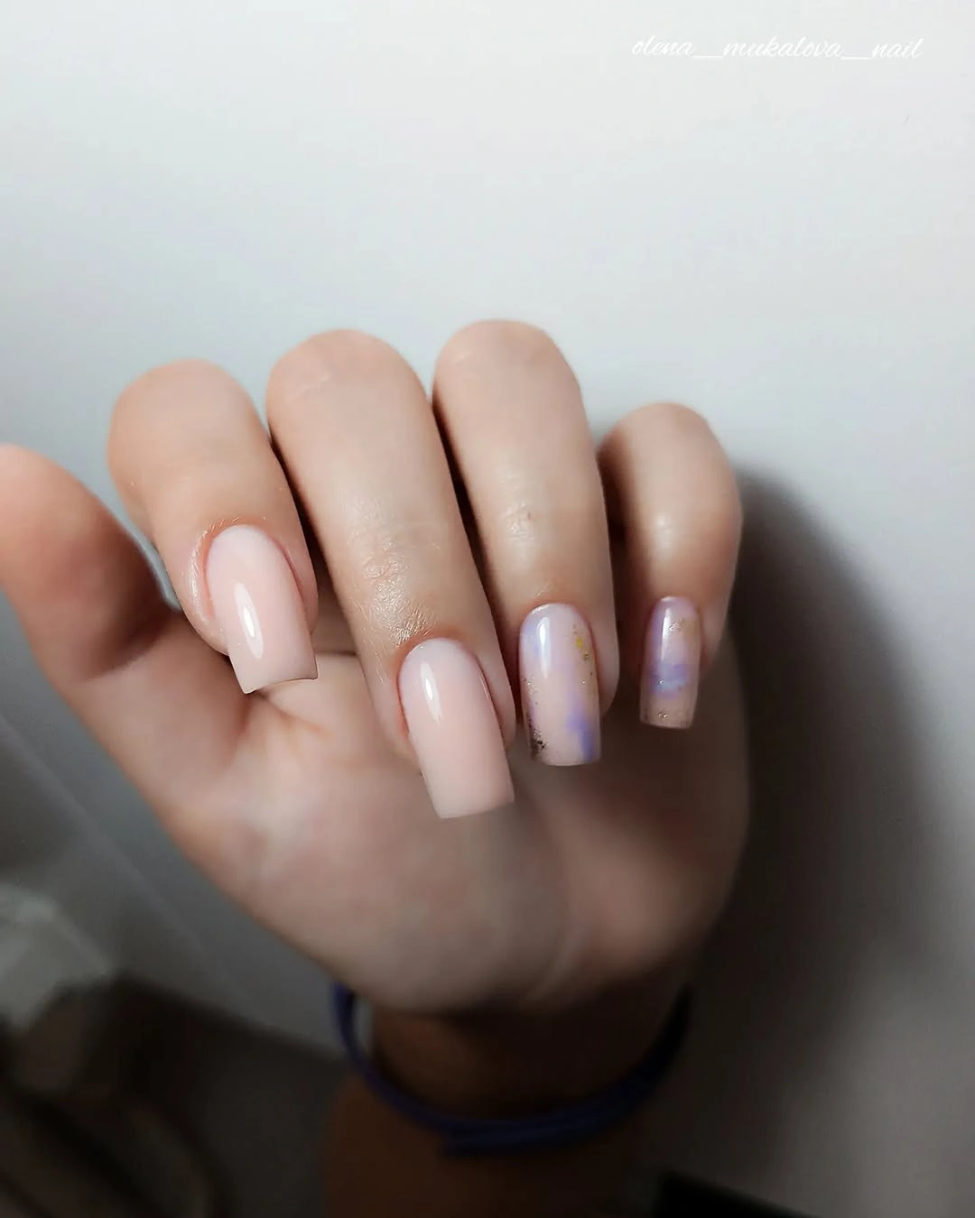 Pale nude square nails with soft pearly lilac reflective-looking tips
