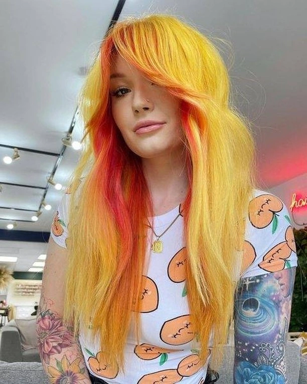 Bright yellow long hair with orange and red face framing