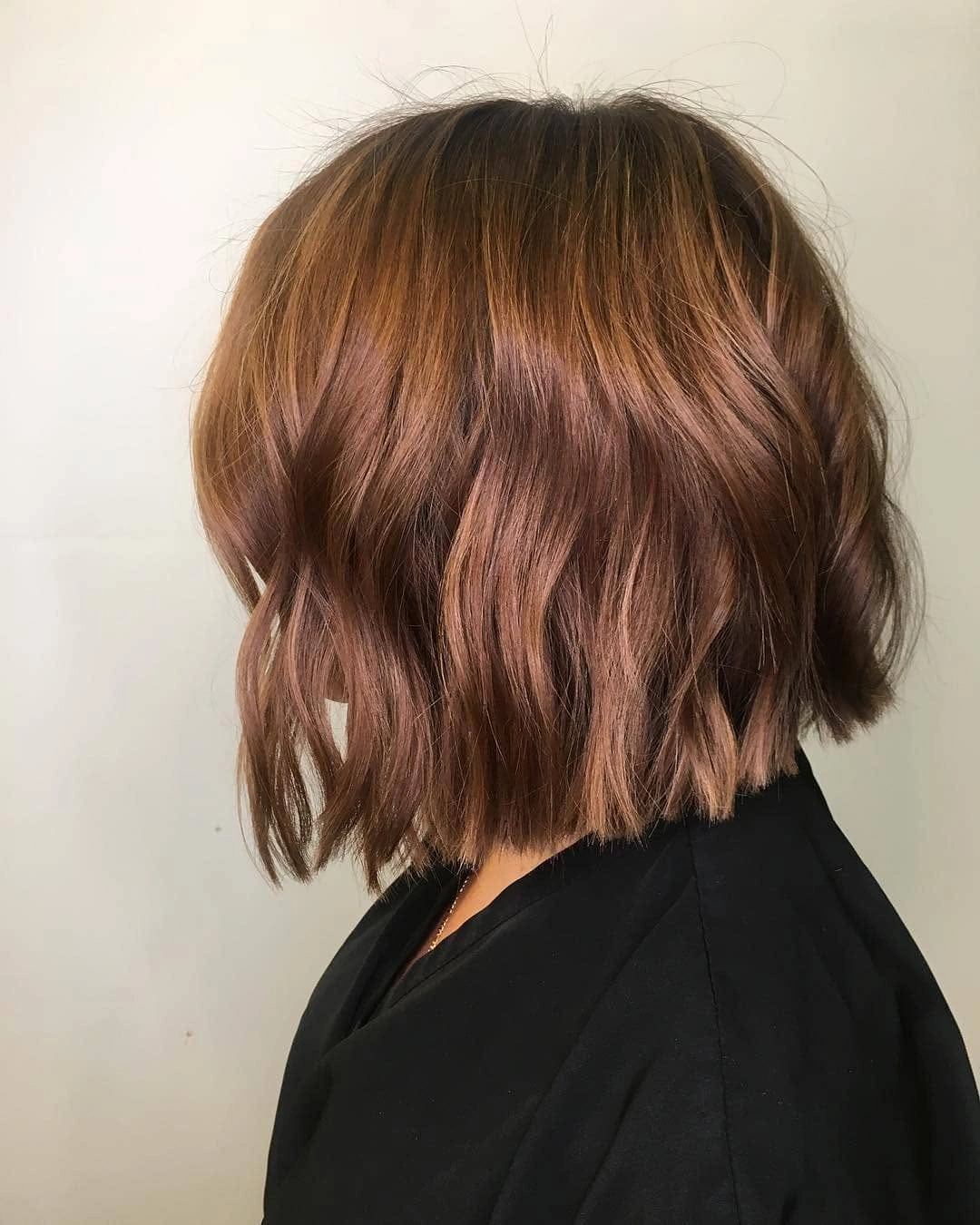 Choppy jaw length wavy brown bob