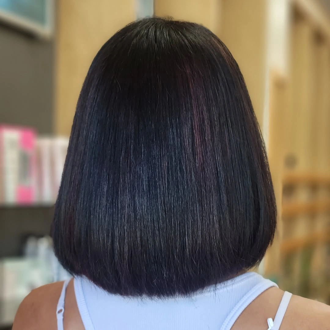 Dark rounded blunt bob at jaw length