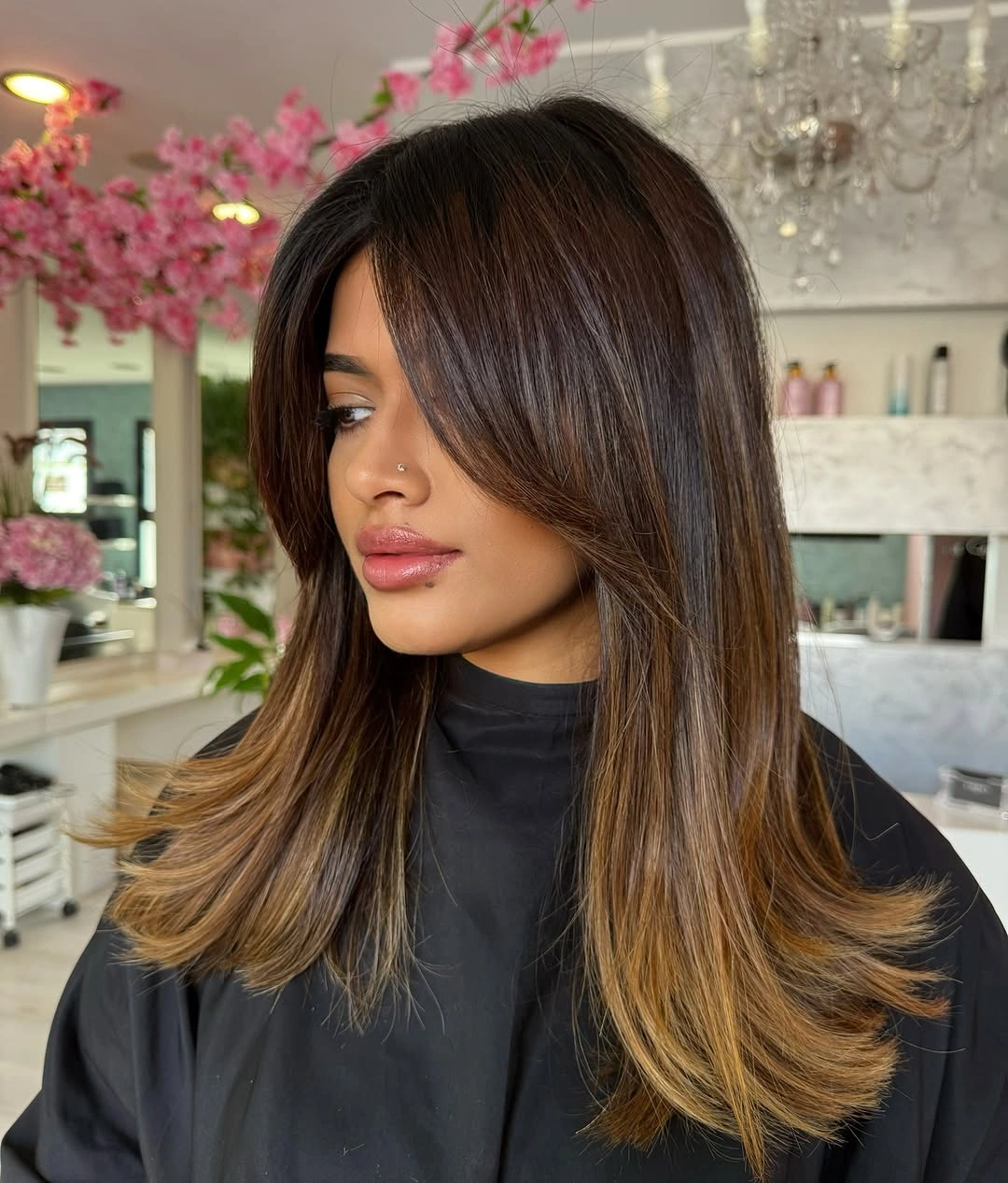 Dark long hair with curtain pieces and flipped ends