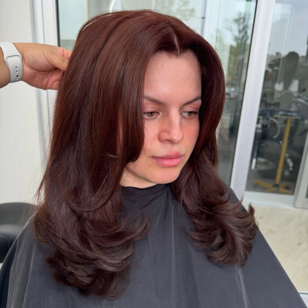 Deep burgundy medium long layers with rounded blowout