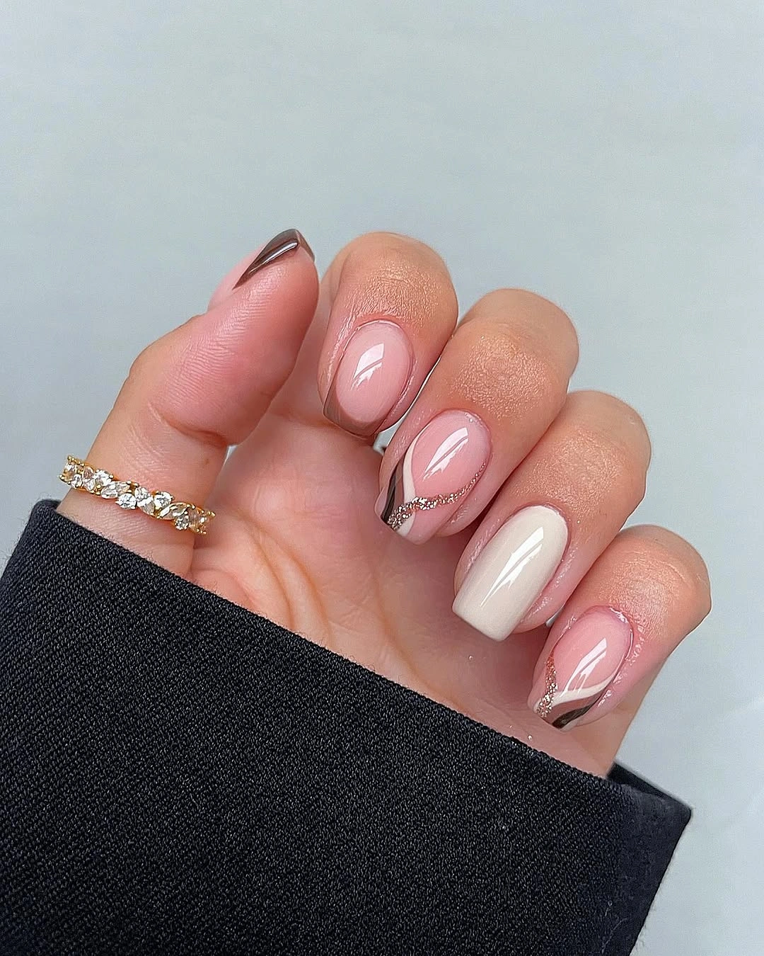 Green square nails with black spiderwebs and dark gradients