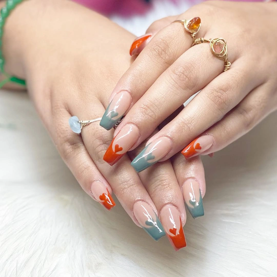 Nude nails with teal coral and pale curved French details