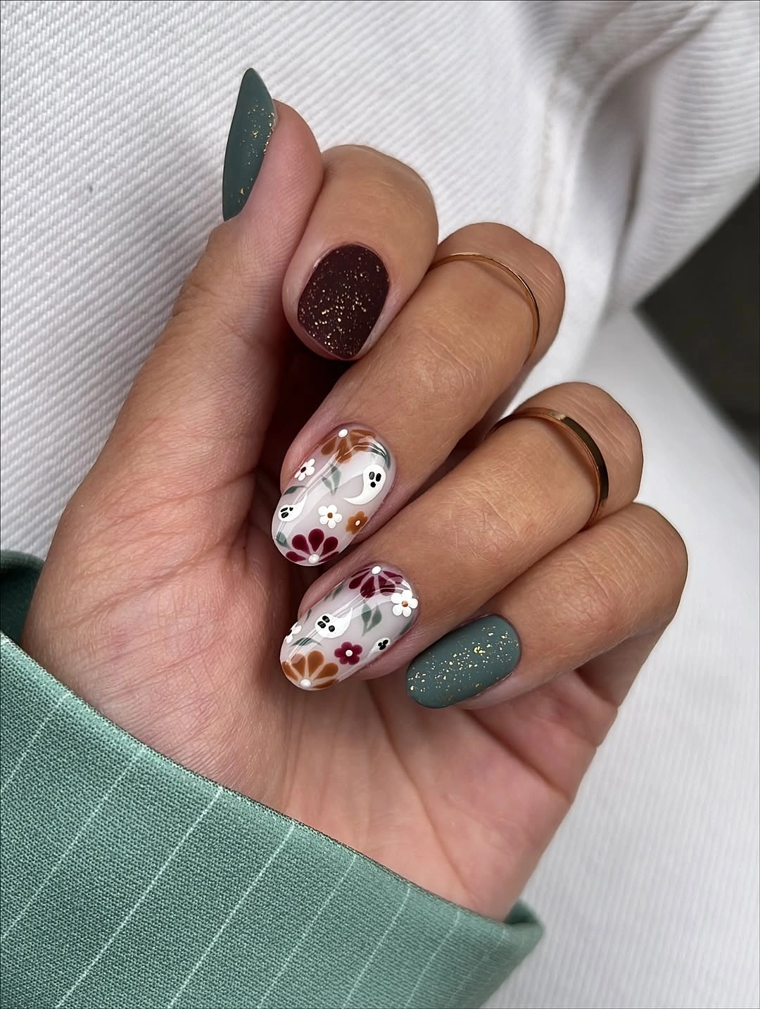 Almond green burgundy white nails with tiny botanical accents