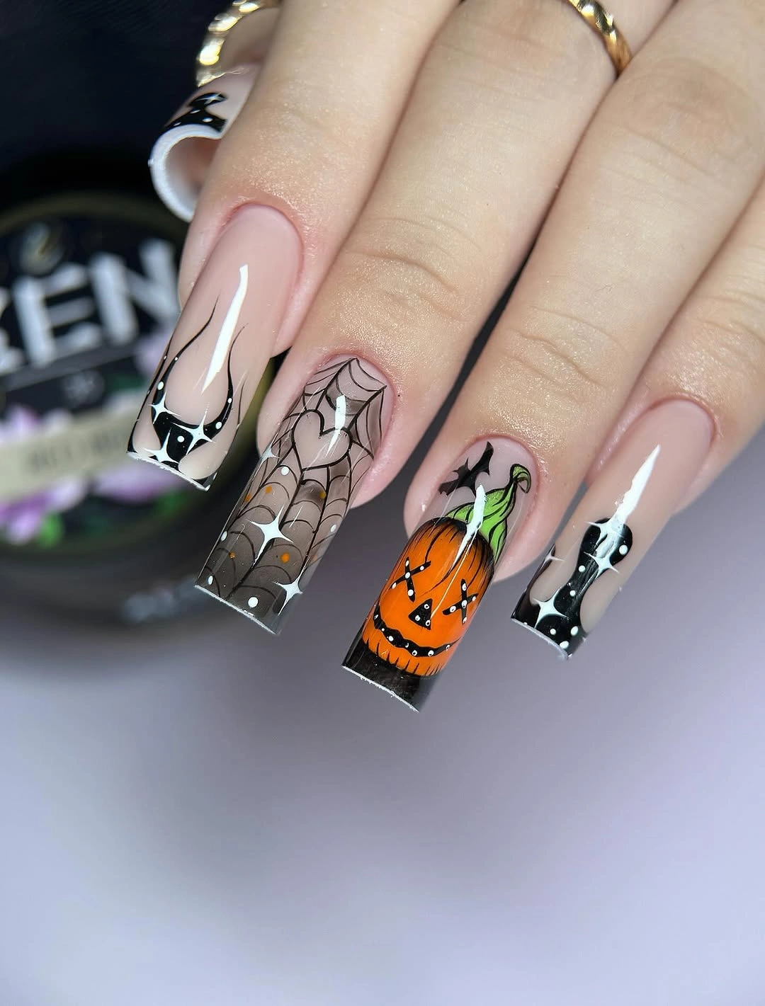 Long coffin Halloween nails with pumpkins webs and black tips