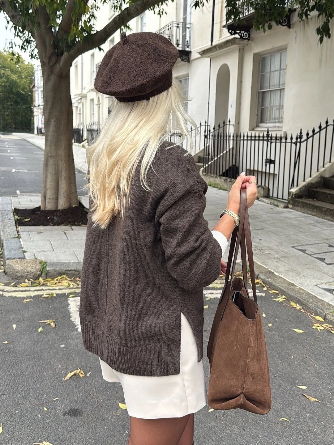 Brown knit beret white mini skirt and brown shoulder bag