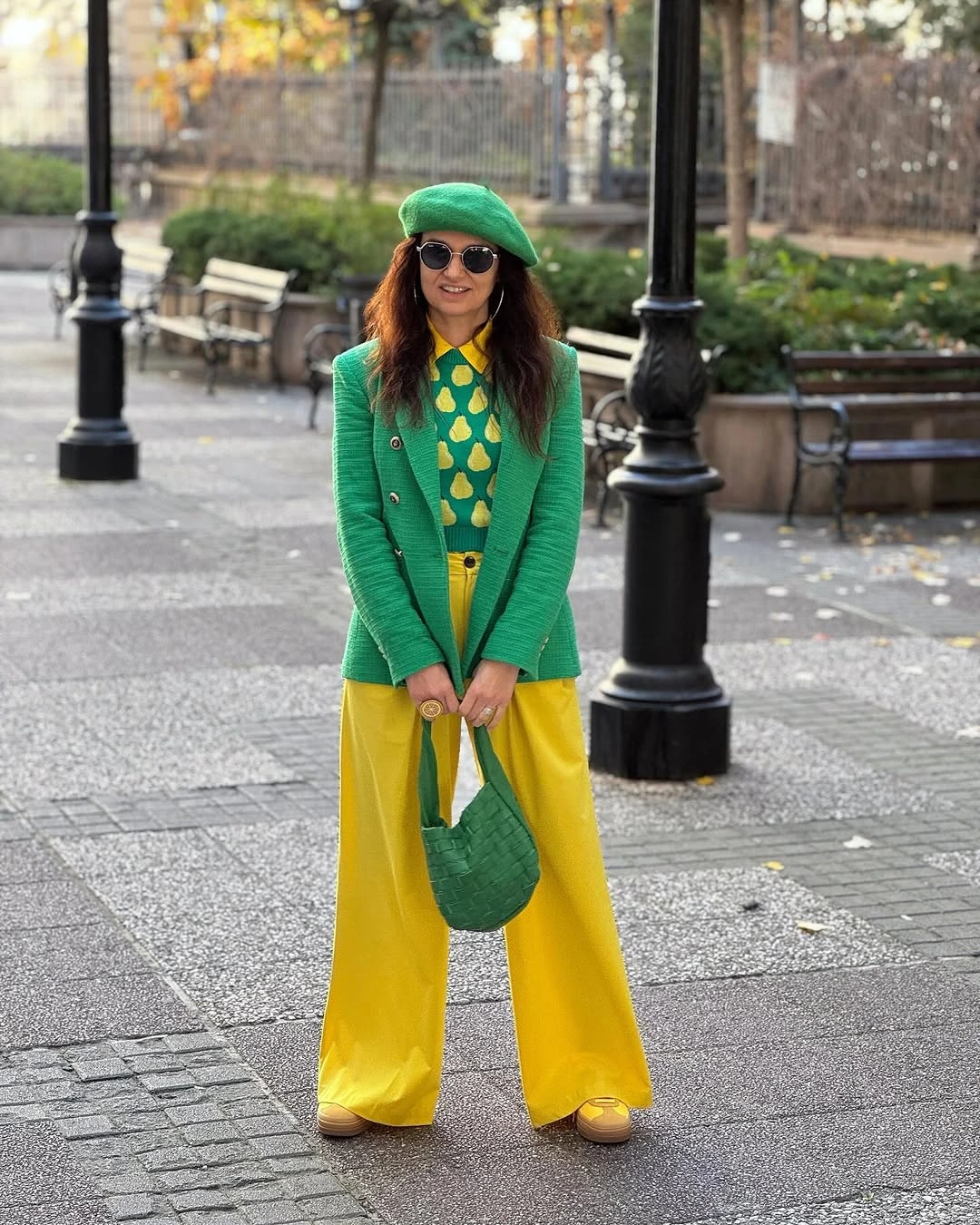 Green blazer with yellow wide-leg trousers and matching accessories