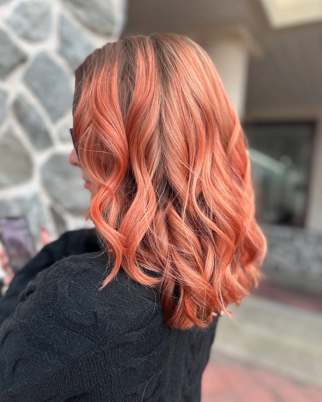 Peach coral shoulder length hair with loose waves