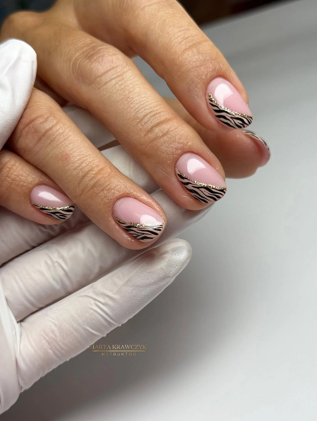 Short pink square nails with black taupe zebra-wave tips