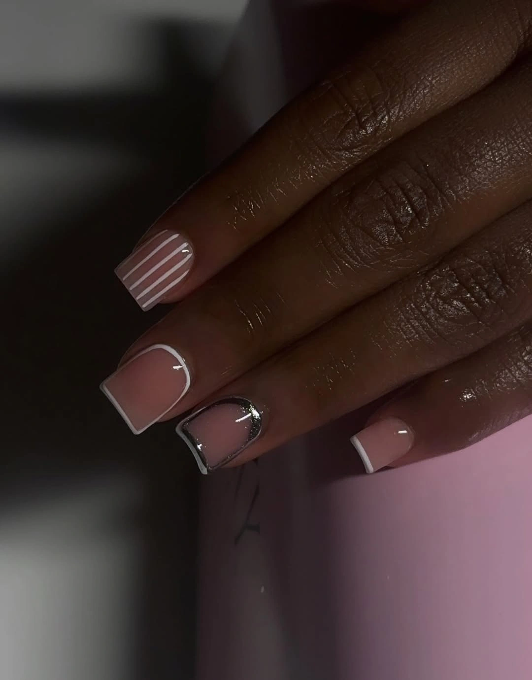 Short nude square nails with white contour French lines