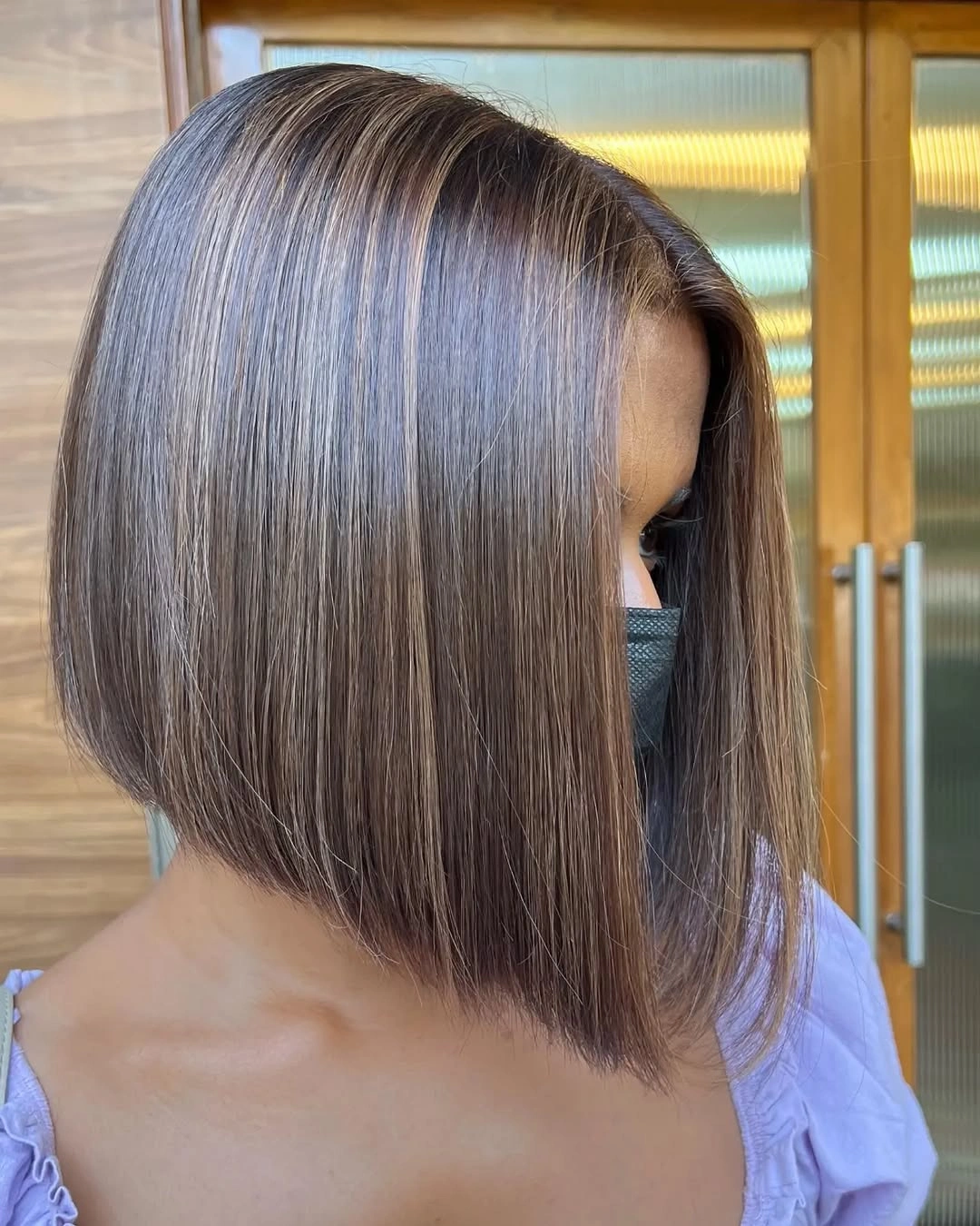 Brunette A-line bob with cool highlights and long front