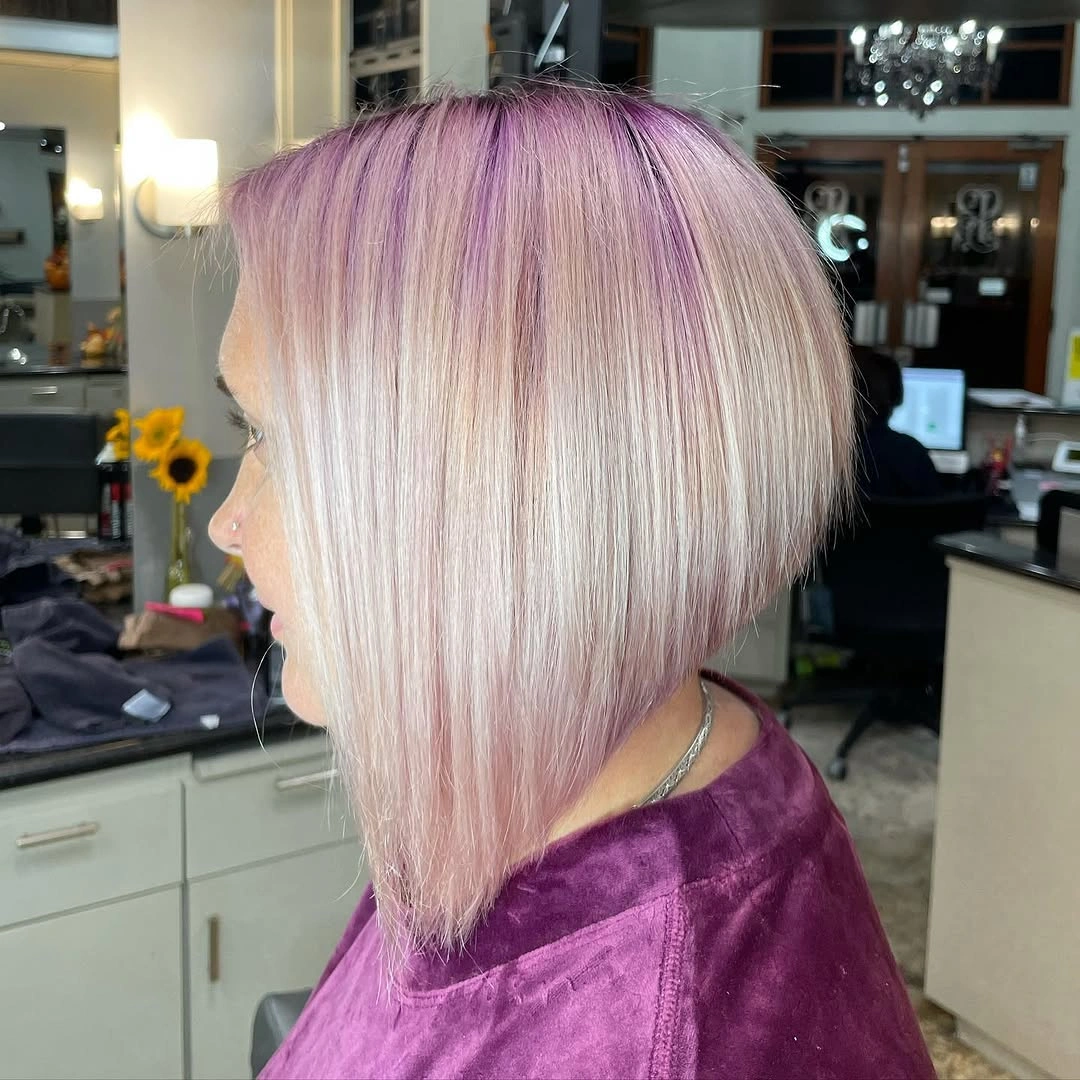 Pale blonde long A-line bob with pink lilac top color