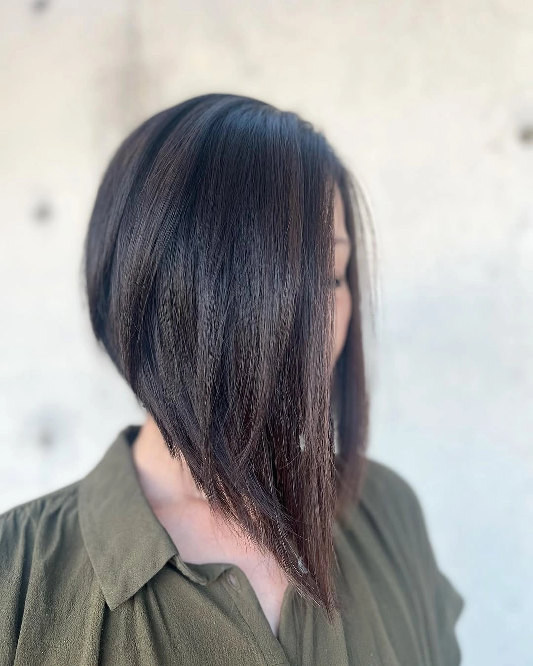 Dark A-line bob with long face-covering front section