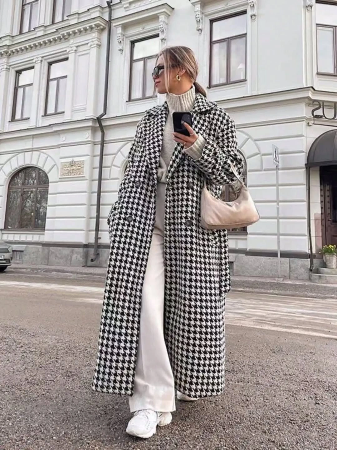 Houndstooth long coat with cream top and white wide trousers