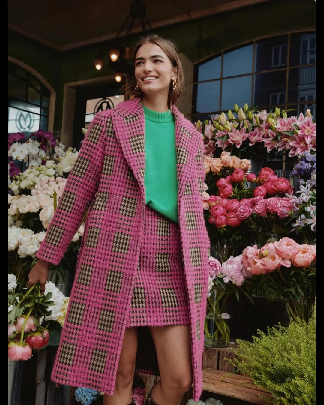 Pink checked coat and mini skirt with bright green knit