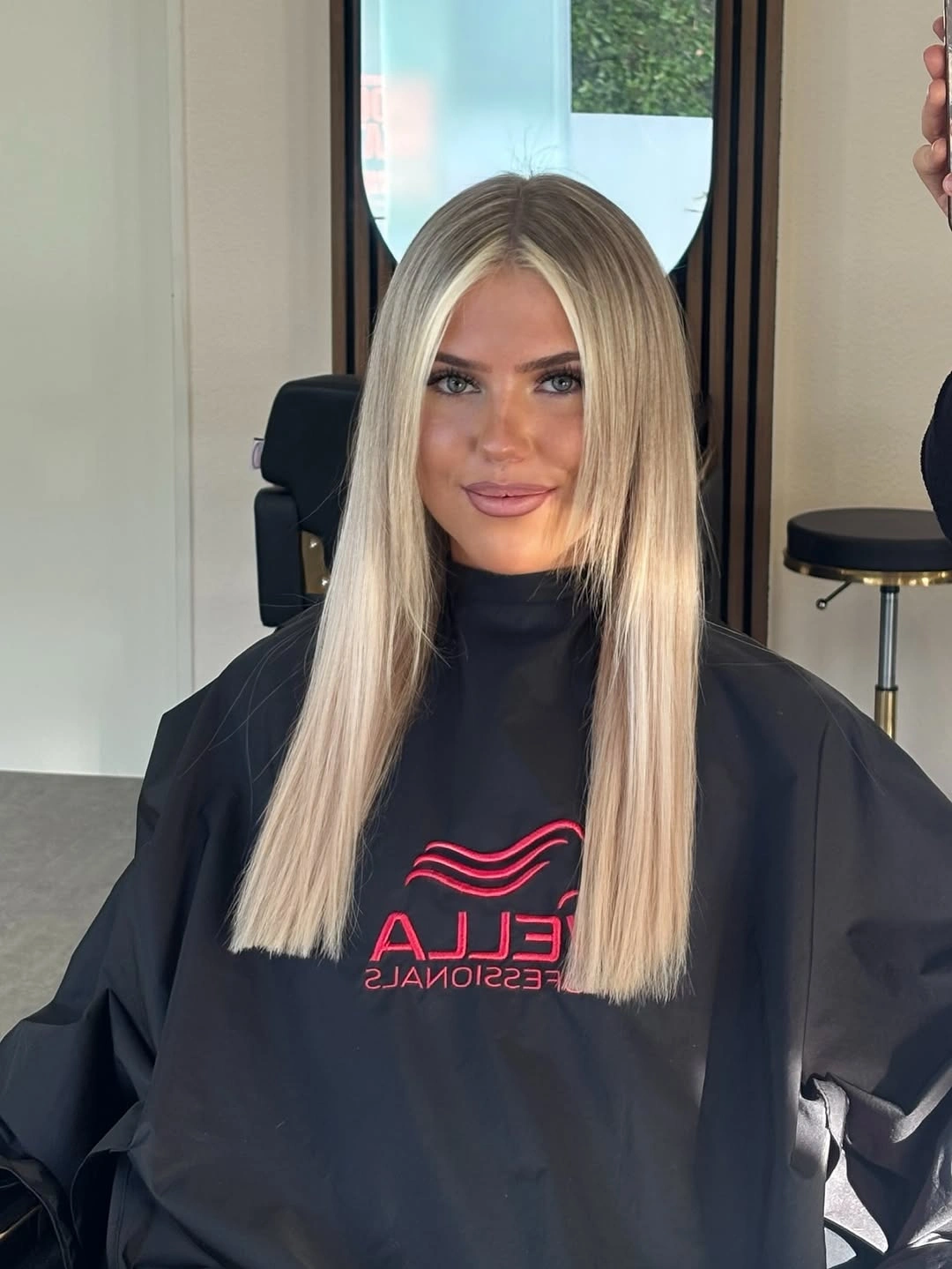 Long straight beige blonde hair with center part