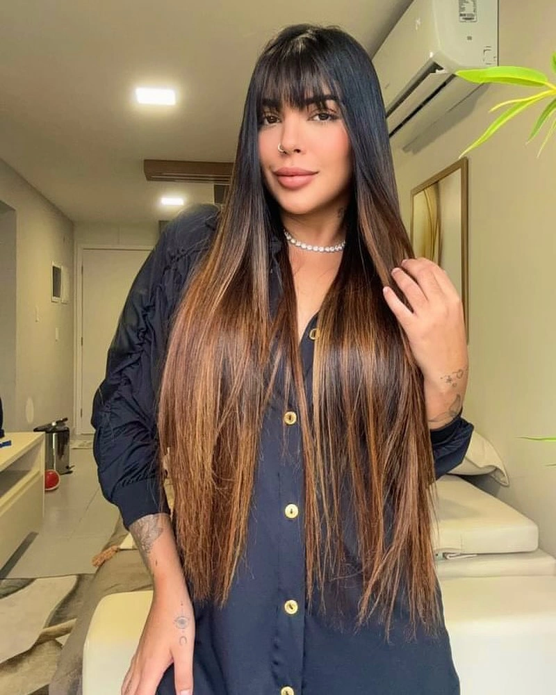 Long straight brunette hair with dark fringe and caramel lower lengths