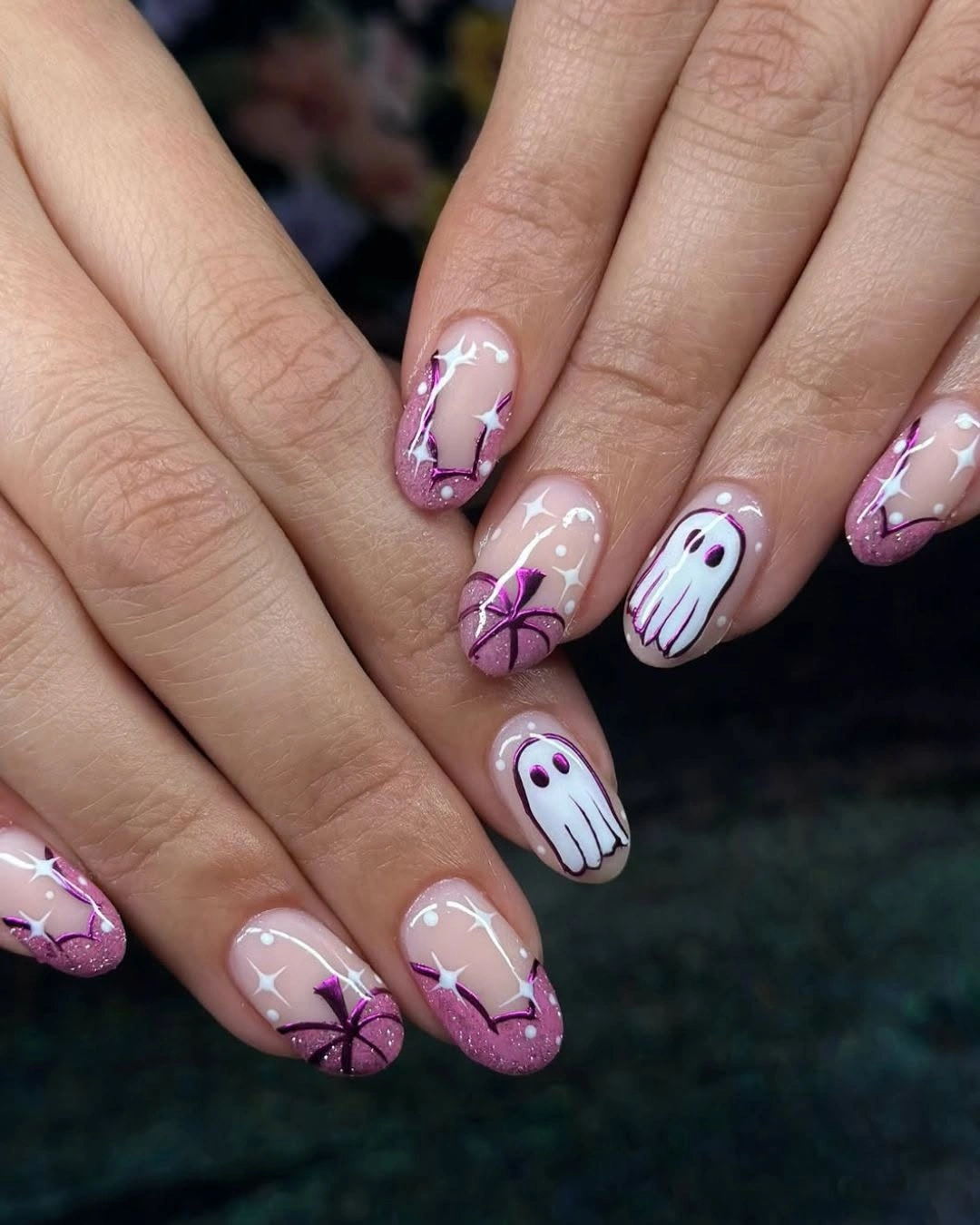Long square nude nails with purple spiderwebs white ghosts and stars