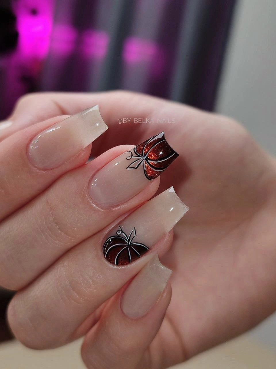 Long clear square nails with black spiderweb French tips and a dark accent