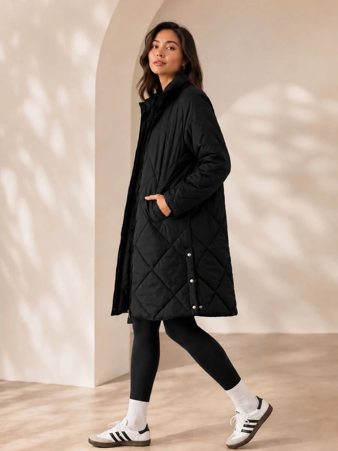 Black quilted coat with leggings, white socks, and sneakers
